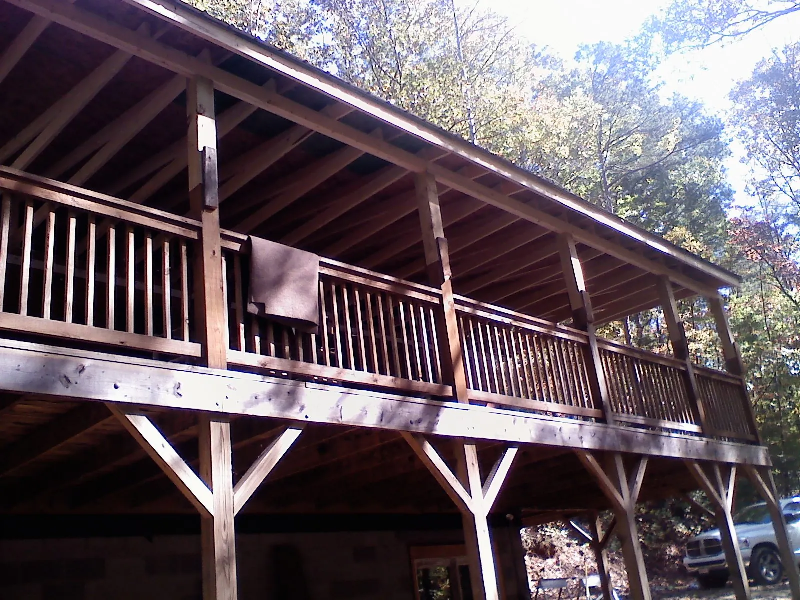 Timber framing under a new elevated porch and deck — Roof Leak Repair in Candor by Roofing Brothers